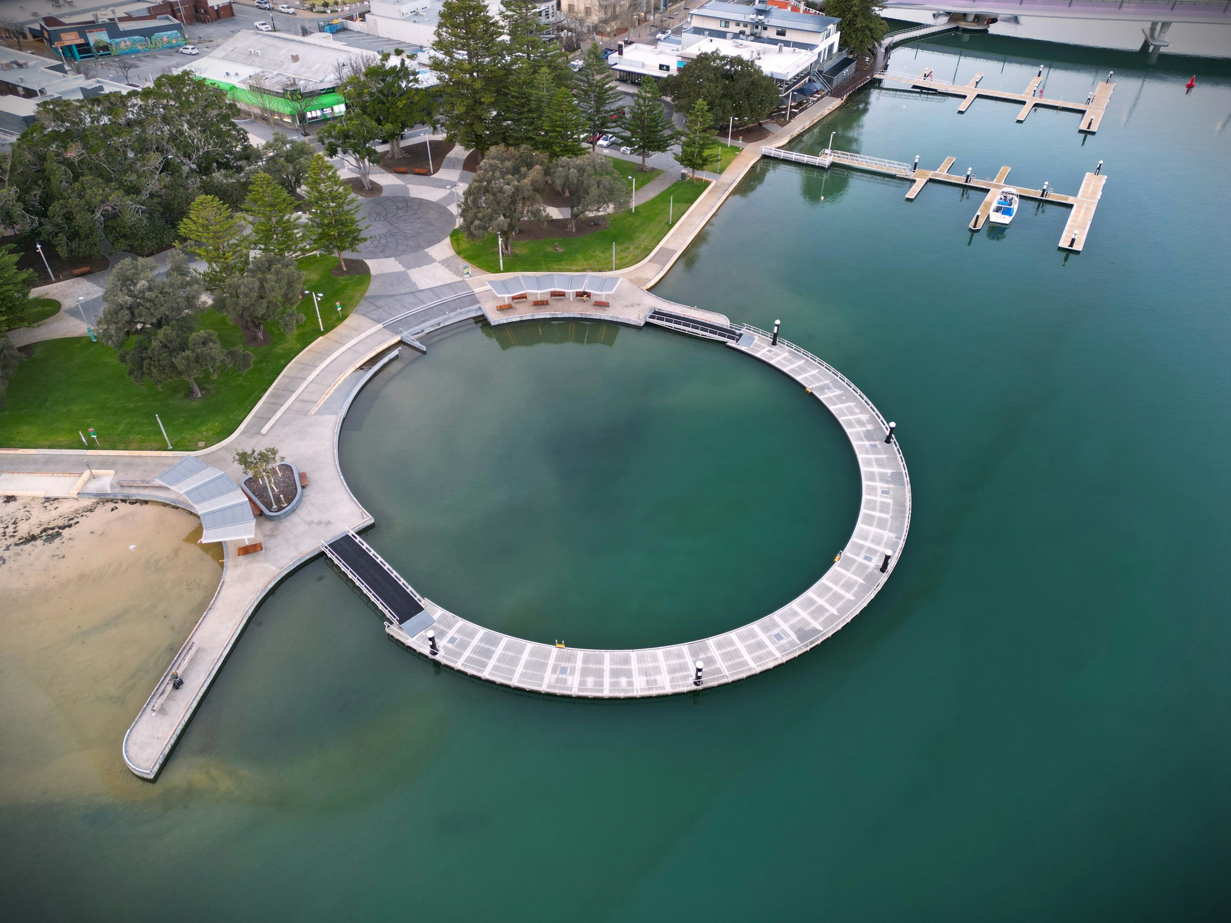 Mandurah's circular foreshore boardwalk from above — Mandurah's home market